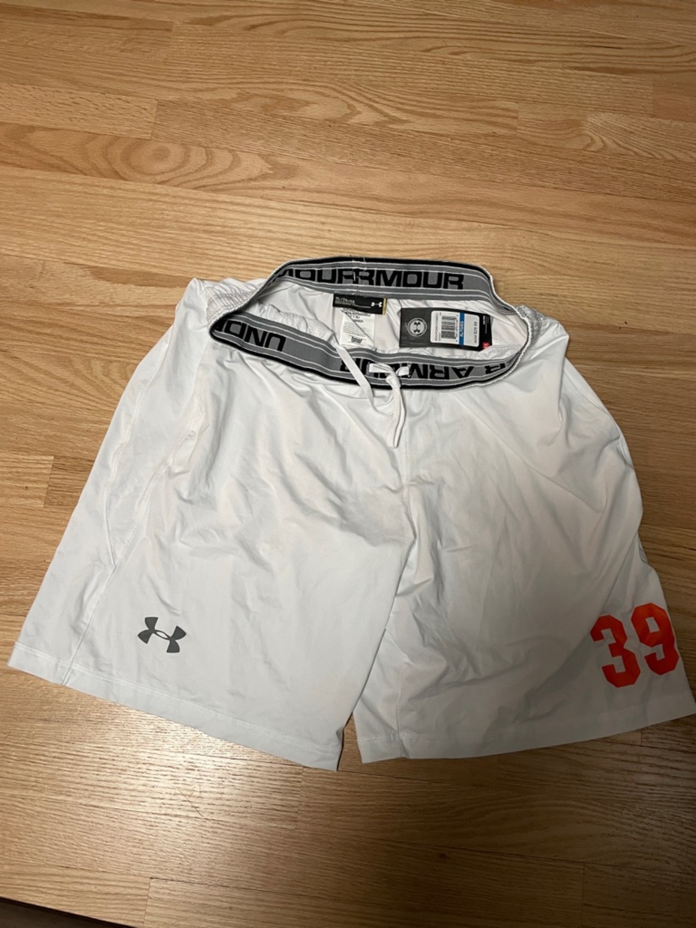 NWT Under Armour Men's White Athletic Shorts with Gray Logo & Orange  Accent 39